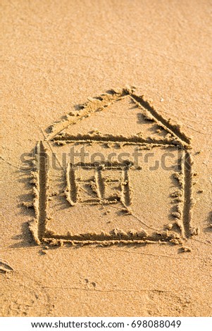 Symbol House on Sand, Small picture of House on the sand beach, concept of risk in real estate financing.little house near sea.Conceptual design.