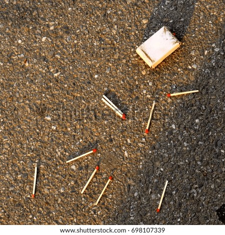 Matches thrown on the street