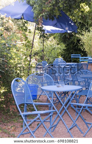 Chairs and Table in the Garden