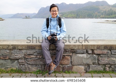 man take picture in England Lake District