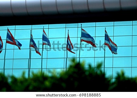 Thai flag on glass wall