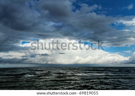	Cloud over sea.