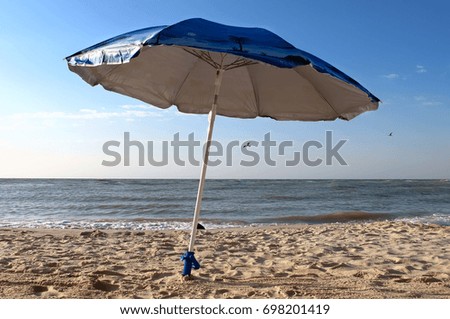 Beach umbrella. Azov, Ukraine                           