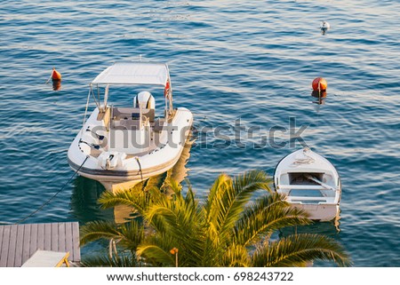 Scenic picture of a white yacht on the adriatic sea, dalmatian coast in Trogir, Croatia