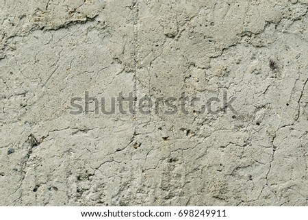 Old grunge cracked concrete wall texture background 