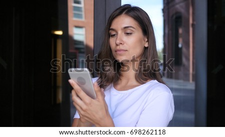 Beautiful Girl Browsing on Smartphone, Using Phone