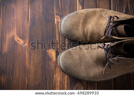 Boots Men's shoes Vintage retro wood background