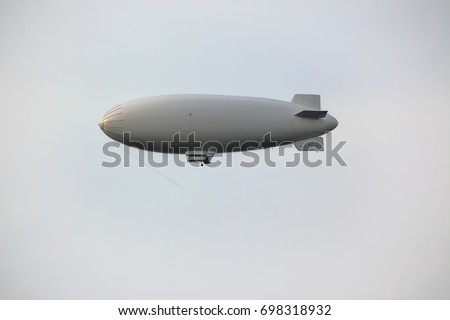 Zeppelin in the sky Royalty-Free Stock Photo #698318932