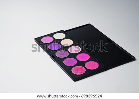 Close-up photo of makeup eyeshadow palette.