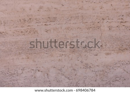Closeup of a Moroccan Red Adobe Mud Wall as background.