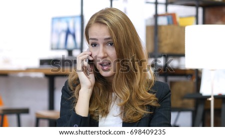 Portrait of Angry Working Girl, Yelling on Phone at Work