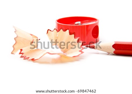 red pencil with shaving on a white background