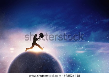 Businessman running with a suitcase against digitally generated image of powder