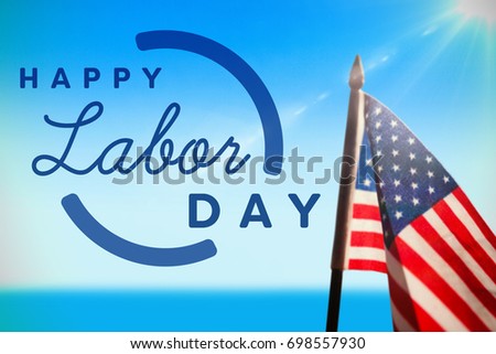 Digital composite image of happy labor day text with blue outline against scenic view of sea against sky
