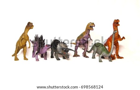 Various type of toy dinosaurs isolated on wgite backgroung
