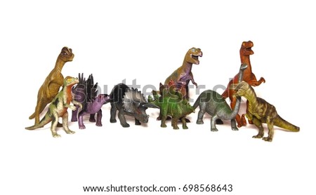 Various type of toy dinosaurs isolated on white backgroud