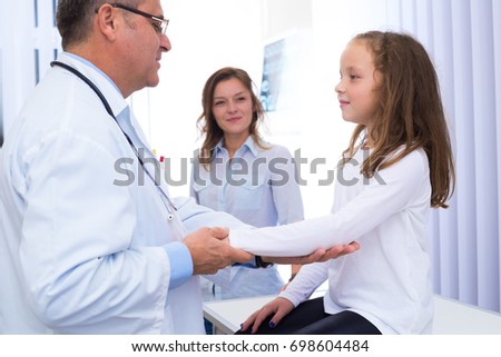 Doctor and young patient in office
