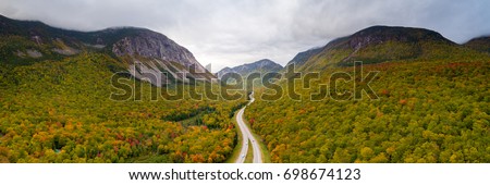 An aerial view of Franconia Notch State Park in the White Mountains of New Hampshire. Royalty-Free Stock Photo #698674123