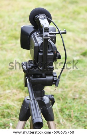 Cute little girl with camcorder isolated selfie