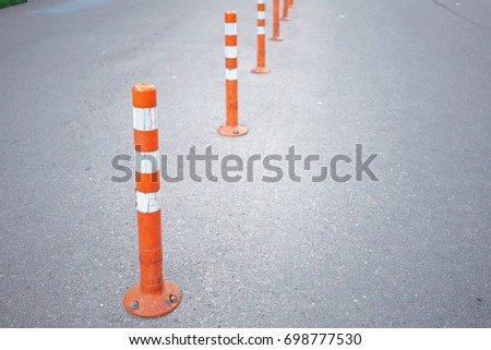 Orange poles for the road