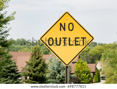 No Outlet street sign at entrance to a nice suburban neighborhood Royalty-Free Stock Photo #698777815