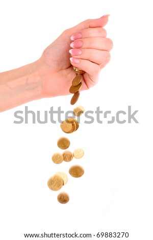 Hand and falling coins isolated on white background