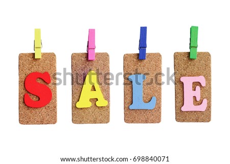Color Sale tag on wooden Cork background isolated on white background. This has clipping path.            