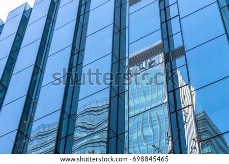 Abstract building. blue glass wall of skyscraper
