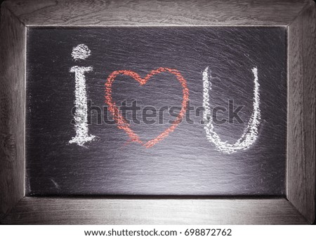 text i love you handwritten and drawn on chalkboard