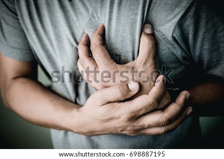 Elderly men with symptoms of acute recurrent heart attack. Royalty-Free Stock Photo #698887195