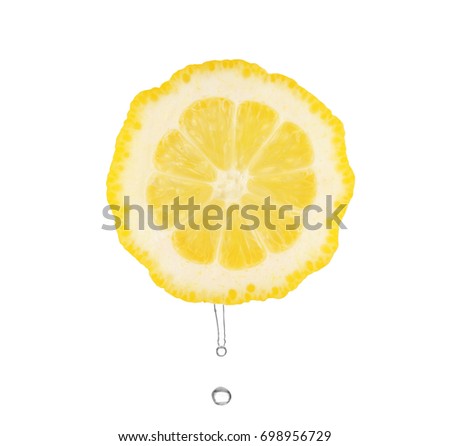 Fresh slice of lemon with water on white background
