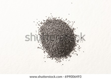 A pile of  Flax seed isolated on white.