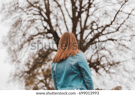 girl from behind red hair