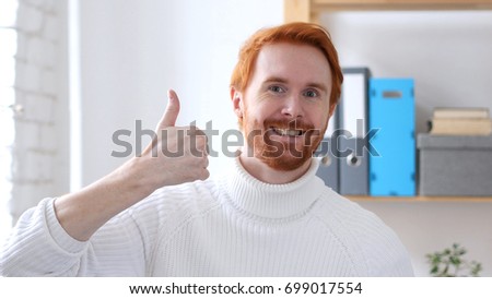 Thumbs Up by Man with Red Hairs