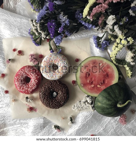juicy Watermelon and delicious Donuts in summer