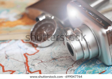 Compass and a camera on the map
