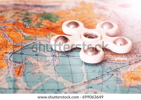 Toy spinner on the map

