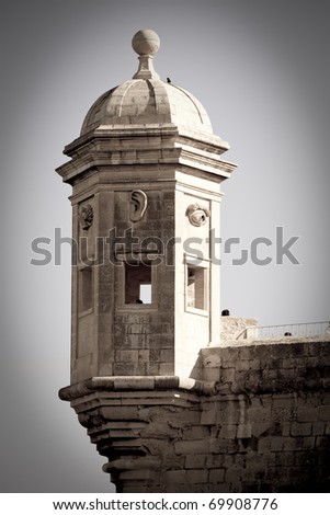 retro photo of Vedette tower over Grand Harbour at Senglea fortress. Malta