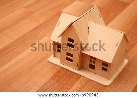 model of house on the wooden foor