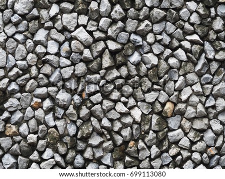 Abstract background with dry round reeble stones.