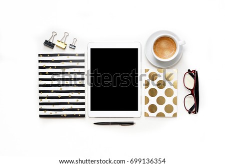Flat lay photo of office white desk with tablet,keyboard and gold notebook with copy space background. Mock up template. Women beauty business