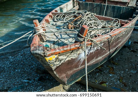 The old boat parked shallow.