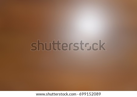 Light reflected on a blur brown background