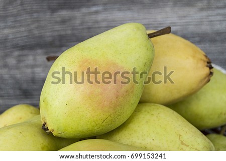 Mature pear pictures in the basket, natural and organic santa maria pear fruit pictures,
