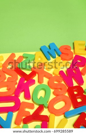 Colored plastic letters. Alphabet.