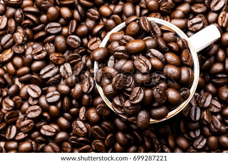 coffee beans cup on wood background