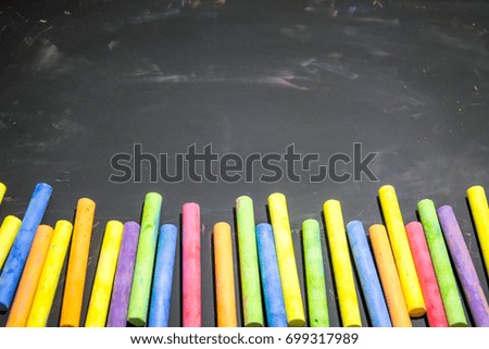 Black chalkboard with colorful chalk, concept for education. 