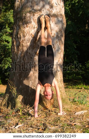 A little girl make hand stand, front walkover, back walkover, cartwheel, wolf jump, elbow stand