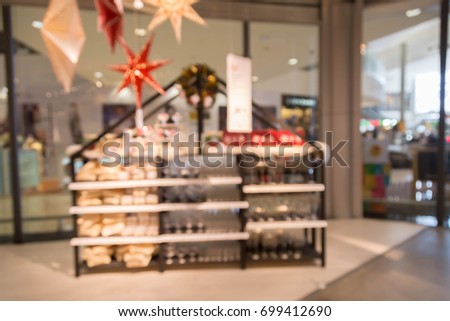blur picture background of Christmas and new year display section display showroom in furniture mall

