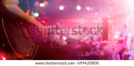 
Guitarist on stage for background, soft and blur concept